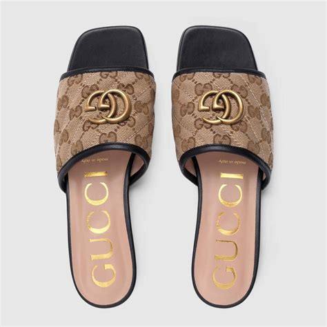 gucci x luis vuitton slides|Gucci rubber slide shoes.